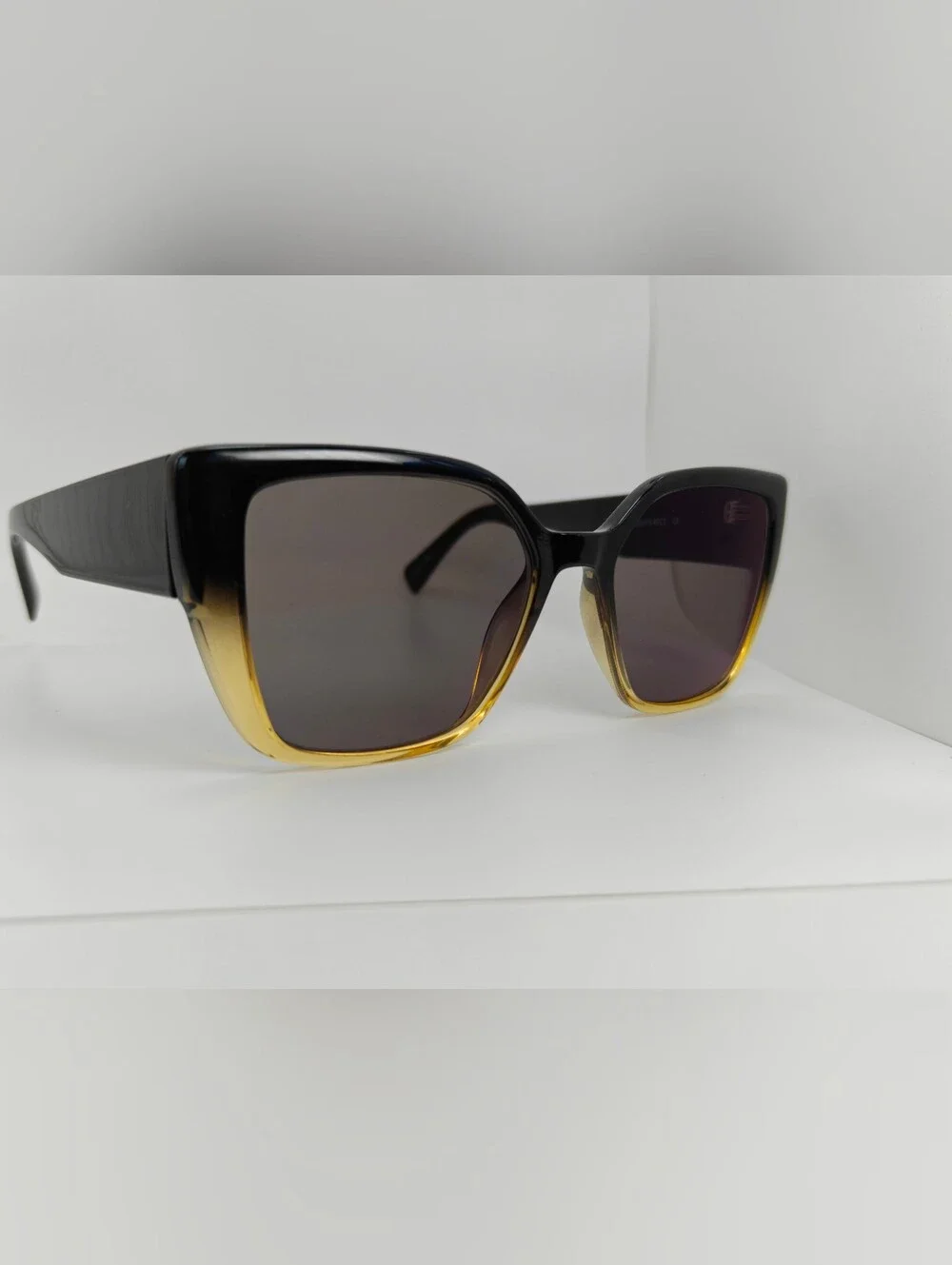 Pierrette. Women's Black to Gold Gradient Cat-Eye Sunglasses.